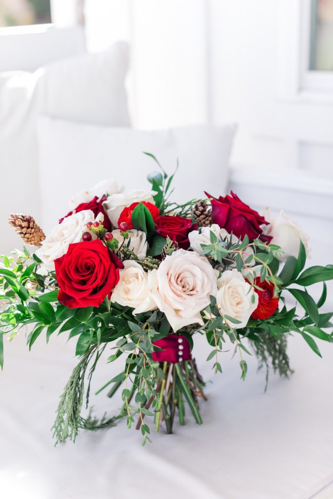 Red and white rose wedding bouquet for winter wedding 