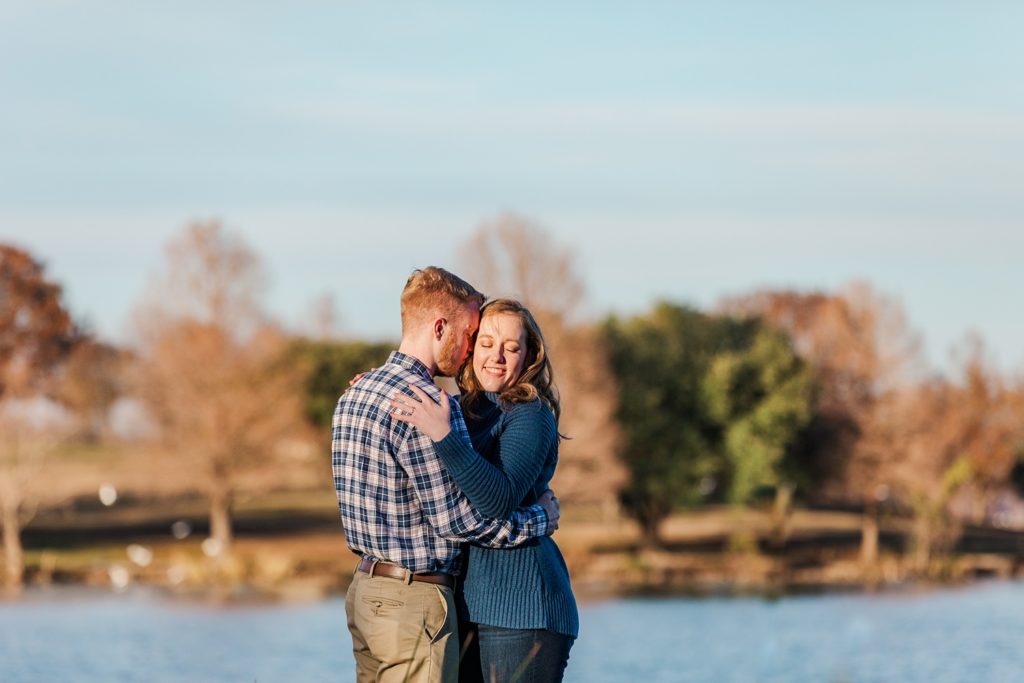 Sunkissed engagement portrait on White Rock Lake in the fall